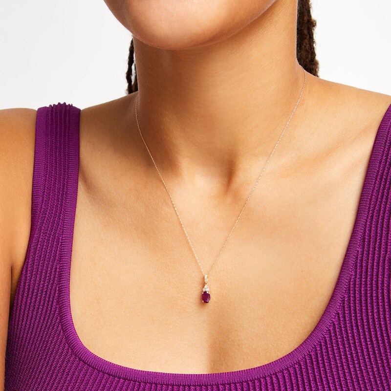 Main Image 2 of Oval Certified Ruby and 1/15 CT. T.W. Diamond Tri-Top Pendant in 10K Gold