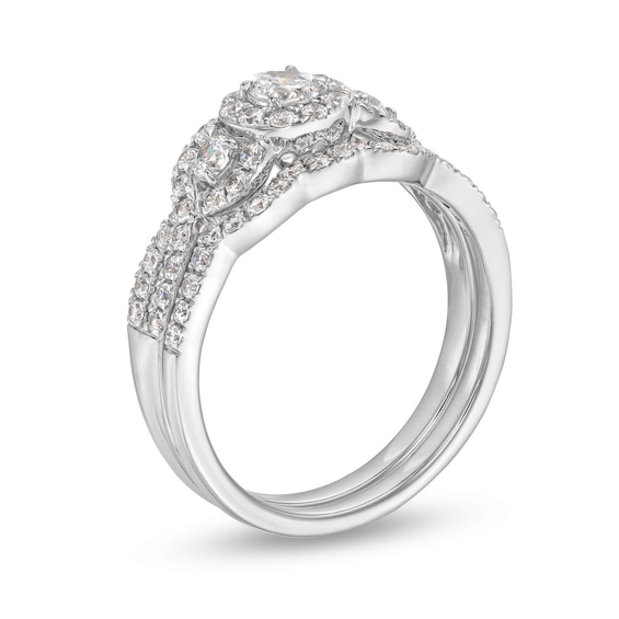 7/8 CT. T.w. Diamond Three Stone Framed Bridal Set in 10K White Gold