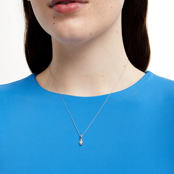1/10 CT. Diamond Solitaire Marquise Frame Drop Pendant in 10K White Gold