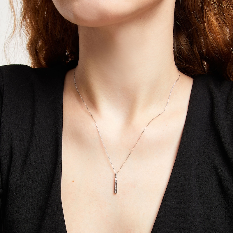 Main Image 2 of 1/10 CT. T.W. Baguette and Round Diamond Linear Bar Pendant in 10K White Gold