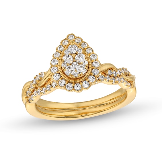 1/2 CT. T.w. Diamond Pear Frame Twist Shank Bridal Set Ring in 10K Gold