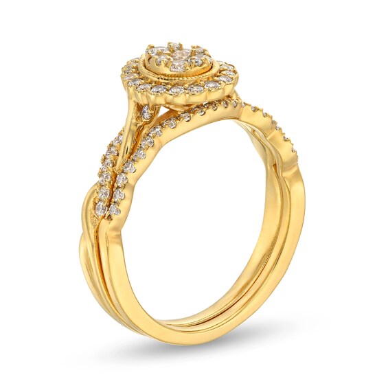 1/2 CT. T.w. Diamond Pear Frame Twist Shank Bridal Set Ring in 10K Gold
