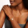 Thumbnail Image 2 of Heart-Shaped Disc Charm Bracelet in Hollow 10K Gold - 7.25"