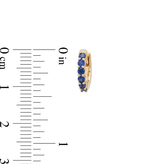 Blue Lab-Created Sapphire Huggie Hoop Earrings in 10K Gold
