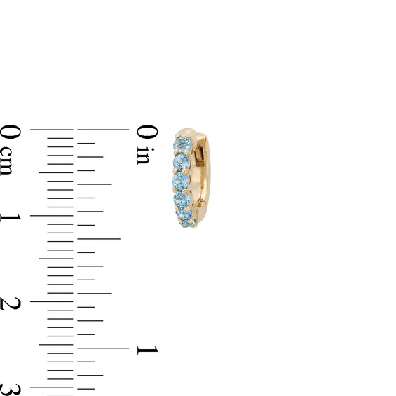 Swiss Blue Topaz Huggie Hoop Earrings in 10K Gold