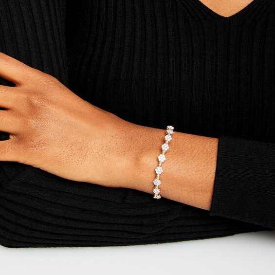 3 CT. T.w. Multi-Diamond Alternating Flower Line Bracelet in 10K Gold - 7.5"