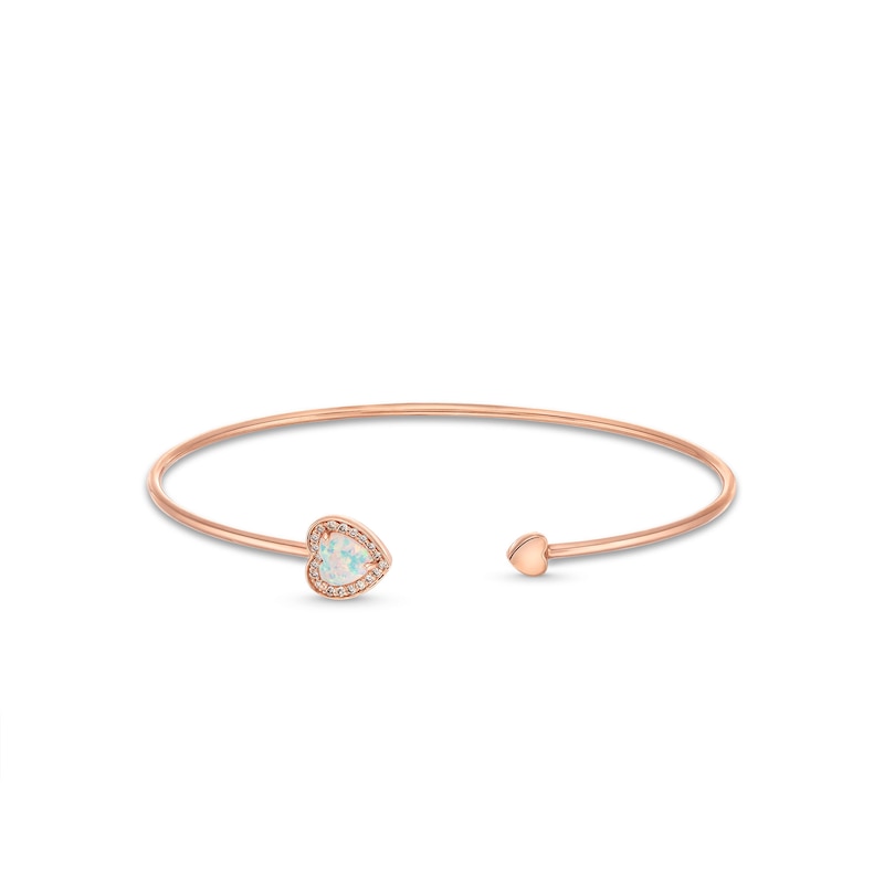 Main Image 1 of 6.0mm Lab-Created Opal and 1/10 CT. T.W. Diamond Frame Double Heart Open Bangle in 10K Rose Gold