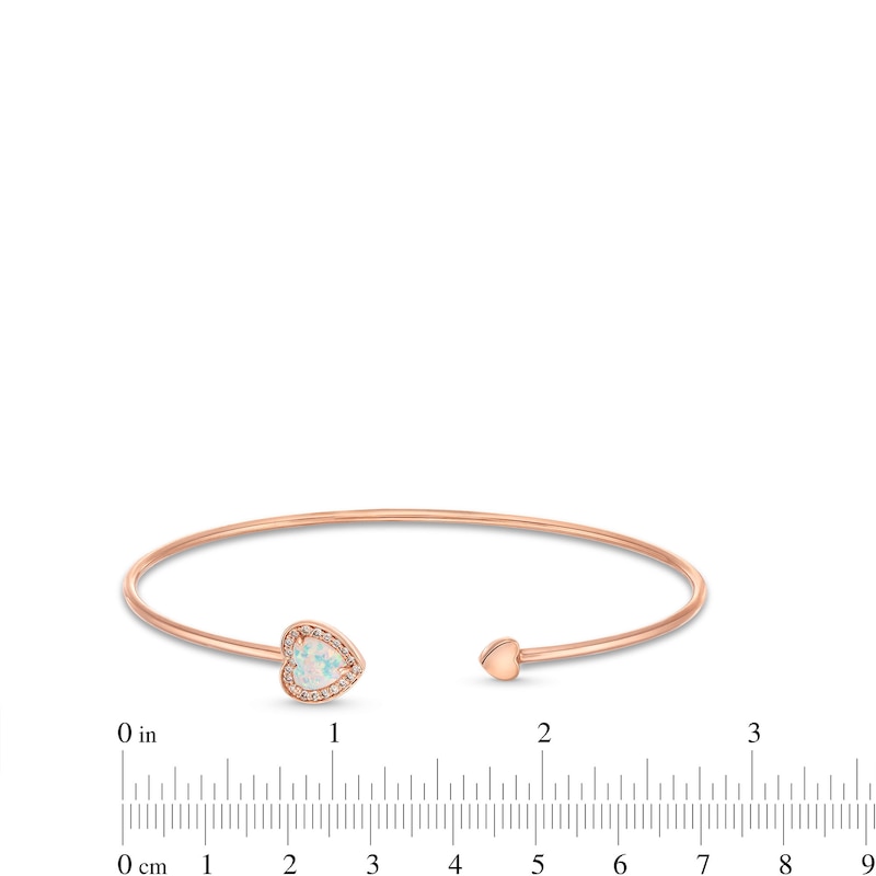 Main Image 3 of 6.0mm Lab-Created Opal and 1/10 CT. T.W. Diamond Frame Double Heart Open Bangle in 10K Rose Gold