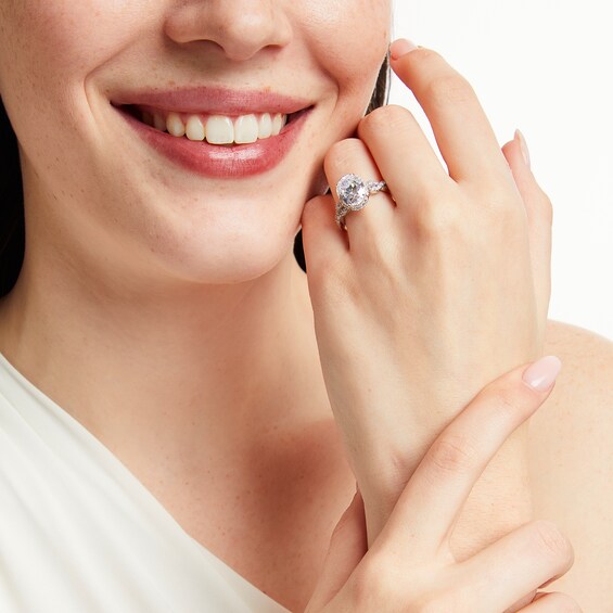 3-1/2 CT. T.w. Certified Oval Lab-Grown Diamond Frame Twist Shank Engagement Ring in 14K White Gold (F/Vs2)