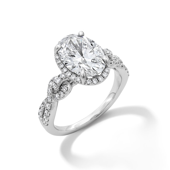 3-1/2 CT. T.w. Certified Oval Lab-Grown Diamond Frame Twist Shank Engagement Ring in 14K White Gold (F/Vs2)