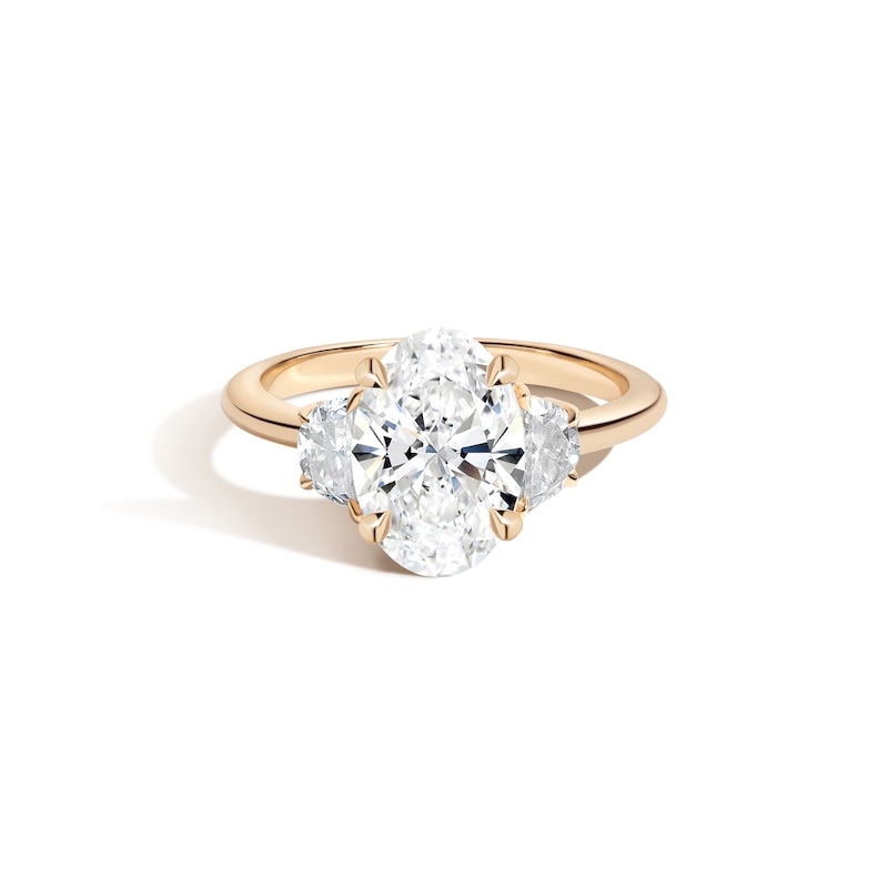 Zales x SHAHLA Certified Oval Lab-Created Center Diamond 2-1/3 CT. T.W. Arch Three Stone Engagement Ring in 14K Gold