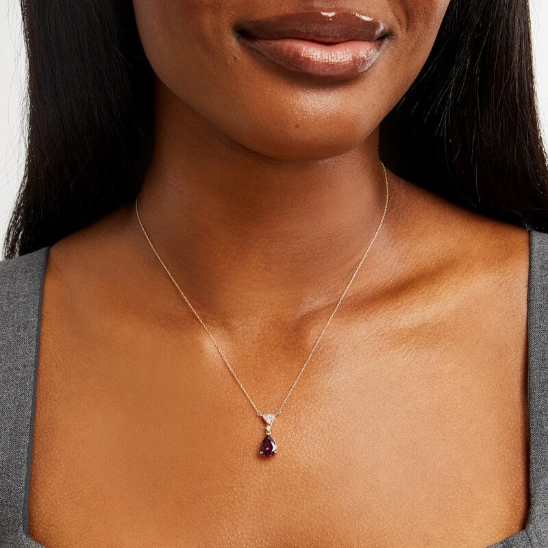 Main Image 2 of Pear-Shaped Rhodolite Garnet and 1/15 CT. T.W. Diamond Drop Necklace in 10K Gold