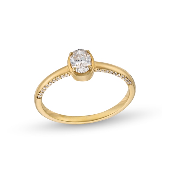 1/2 CT. T.w. Oval Diamond Solitaire Engagement Ring in 14K Gold