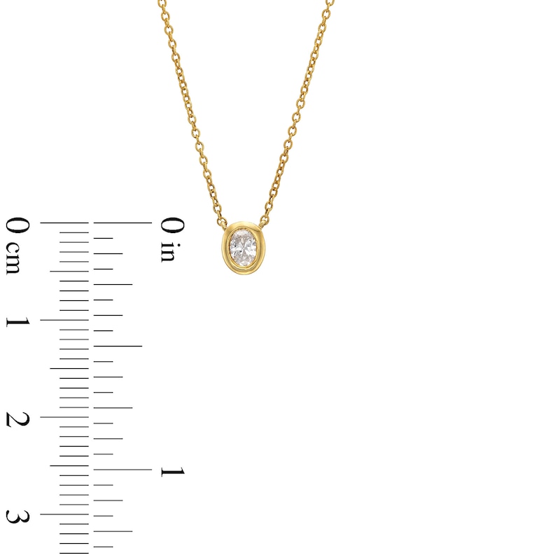 Main Image 3 of 1/5 CT. Oval Diamond Bezel-Set Solitaire Necklace in 14K Gold