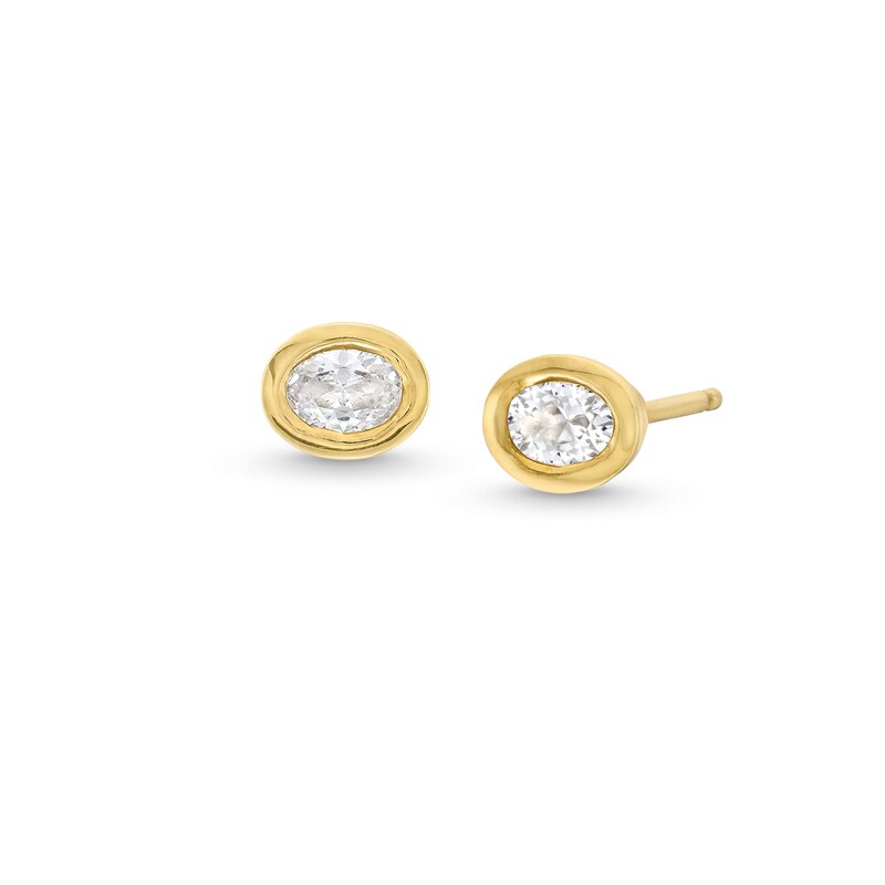 Main Image 1 of 3/8 CT. T.W. Oval Diamond Bezel-Set Solitaire Stud Earrings in 14K Gold