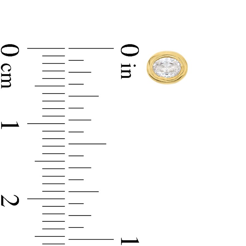 Main Image 3 of 3/8 CT. T.W. Oval Diamond Bezel-Set Solitaire Stud Earrings in 14K Gold