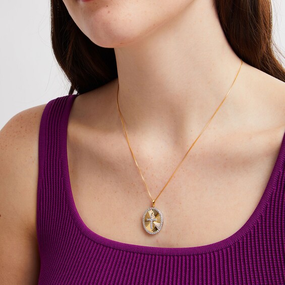 1/2 CT. T.w. Diamond Cross Oval Frame Medallion Pendant in 10K Gold