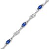 Thumbnail Image 1 of Oval Blue and White Lab-Created Sapphire Bypass Wave Alternating Line Bracelet in Sterling Silver - 7.25"