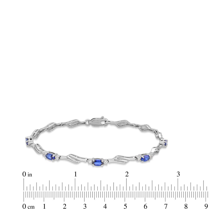 Main Image 3 of Oval Blue and White Lab-Created Sapphire Bypass Wave Alternating Line Bracelet in Sterling Silver - 7.25"