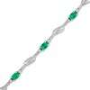 Thumbnail Image 1 of Oval Lab-Created Emerald and White Lab-Created Sapphire Bypass Wave Alternating Line Bracelet in Sterling Silver