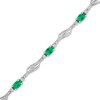 Thumbnail Image 0 of Oval Lab-Created Emerald and White Lab-Created Sapphire Bypass Wave Alternating Line Bracelet in Sterling Silver