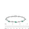 Thumbnail Image 3 of Oval Lab-Created Emerald and White Lab-Created Sapphire Bypass Wave Alternating Line Bracelet in Sterling Silver