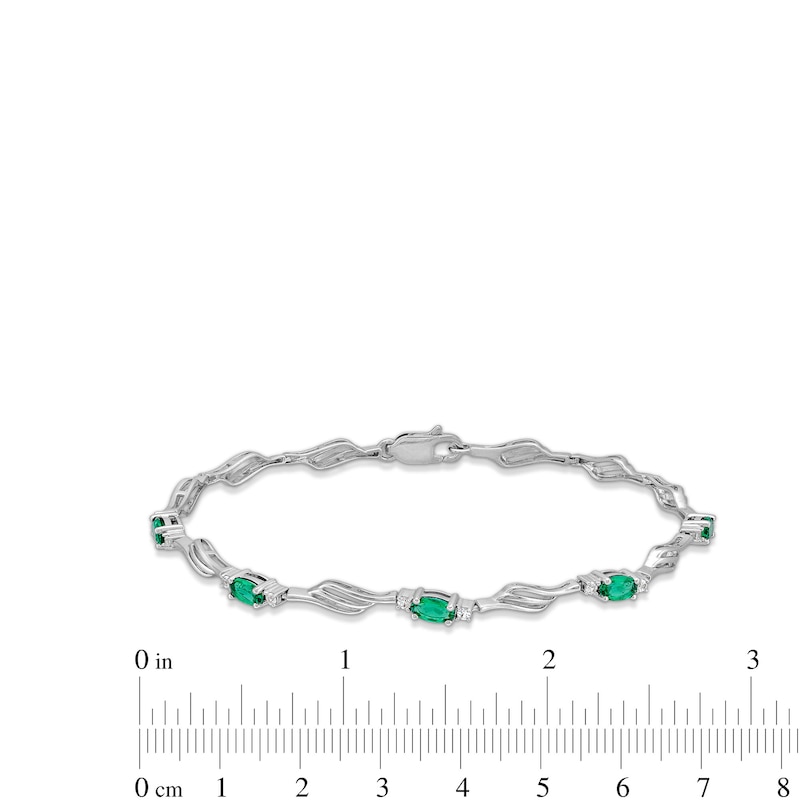 Main Image 3 of Oval Lab-Created Emerald and White Lab-Created Sapphire Bypass Wave Alternating Line Bracelet in Sterling Silver