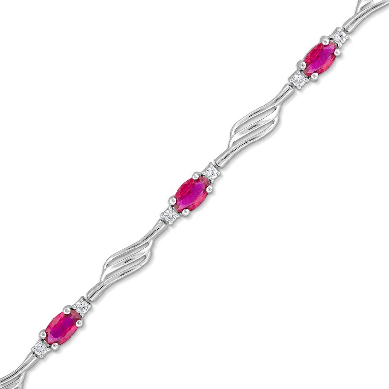Main Image 1 of Oval Lab-Created Ruby and White Lab-Created Sapphire Bypass Wave Alternating Line Bracelet in Sterling Silver - 7.25"
