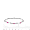 Thumbnail Image 3 of Oval Lab-Created Ruby and White Lab-Created Sapphire Bypass Wave Alternating Line Bracelet in Sterling Silver - 7.25"