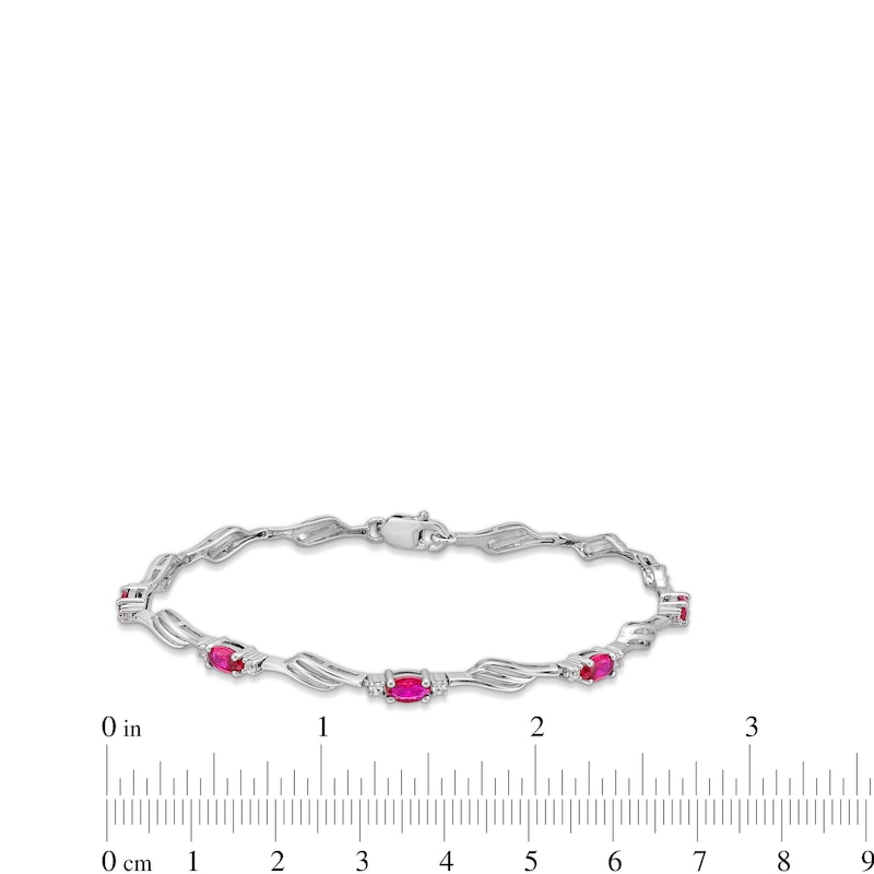Main Image 3 of Oval Lab-Created Ruby and White Lab-Created Sapphire Bypass Wave Alternating Line Bracelet in Sterling Silver - 7.25"