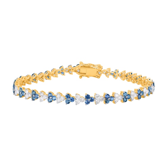 Blue Sapphire and 2-1/2 CT. T.w. Diamond Alternating Trios Tennis Bracelet in 10K Gold