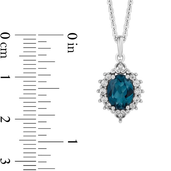 Enchanted Disney Cinderella Oval London Blue Topaz and 1/6 CT. T.w. Diamond Frame Pendant in Sterling Silver - 19â