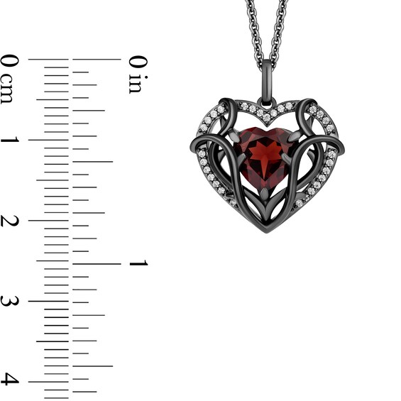 Enchanted Disney Villains Evil Queen Heart-Shaped Garnet and 1/8 CT. T.w. Diamond Frame Pendant in Sterling Silver