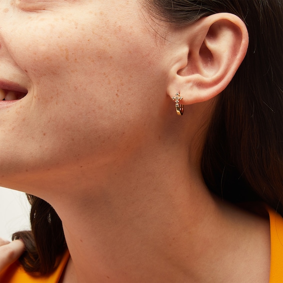 1/4 CT. T.w. Diamond Cross Huggie Hoop Earrings in 10K Gold