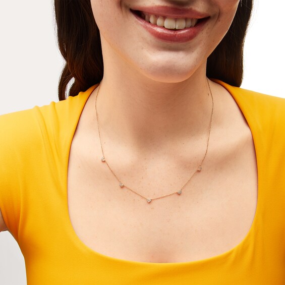 1/4 CT. T.w. Heart-Shaped Multi-Diamond Five Stone Station Necklace in 10K Gold