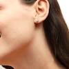 Thumbnail Image 2 of 1/2 CT. T.W. Pear-Shaped Diamond Sunburst Frame Stud Earrings in 10K Gold