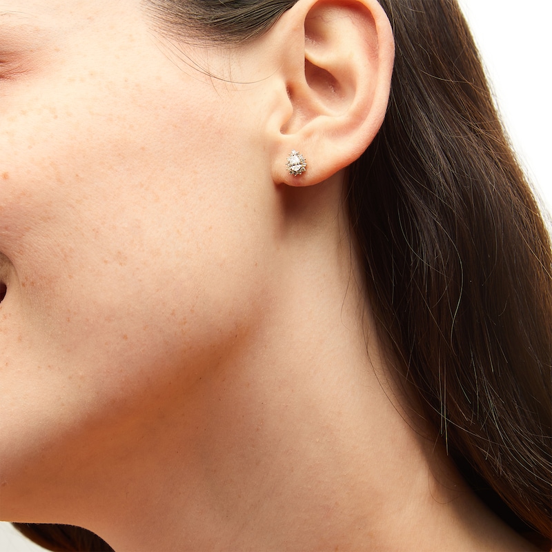 Main Image 2 of 1/2 CT. T.W. Pear-Shaped Diamond Sunburst Frame Stud Earrings in 10K Gold