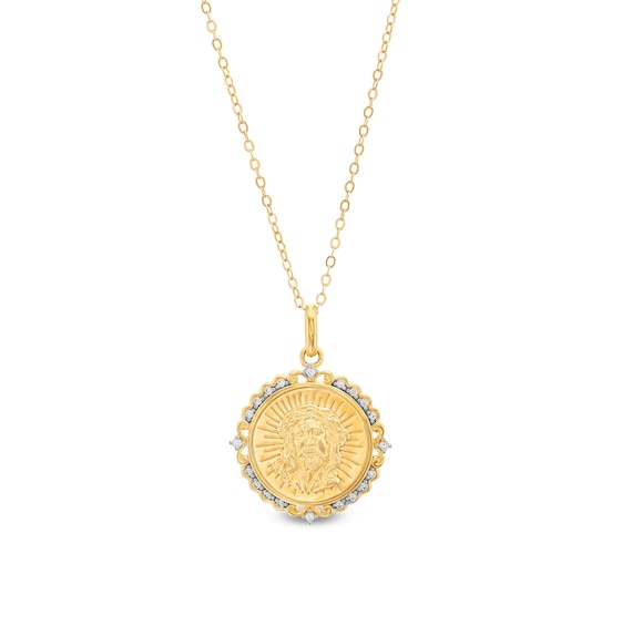 1/10 CT. T.w. Diamond Scallop Frame Jesus Medallion Pendant in 10K Gold
