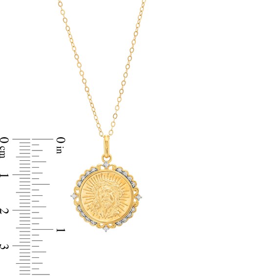 1/10 CT. T.w. Diamond Scallop Frame Jesus Medallion Pendant in 10K Gold