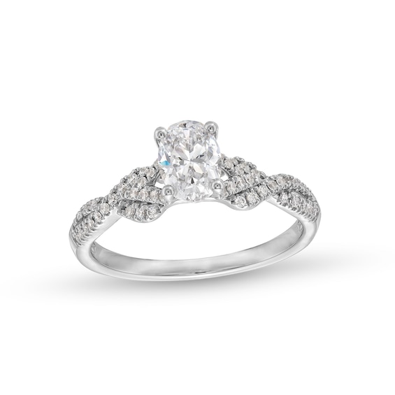 3/4 CT. T.w. Oval Diamond Twist Shank Engagement Ring in 14K White Gold