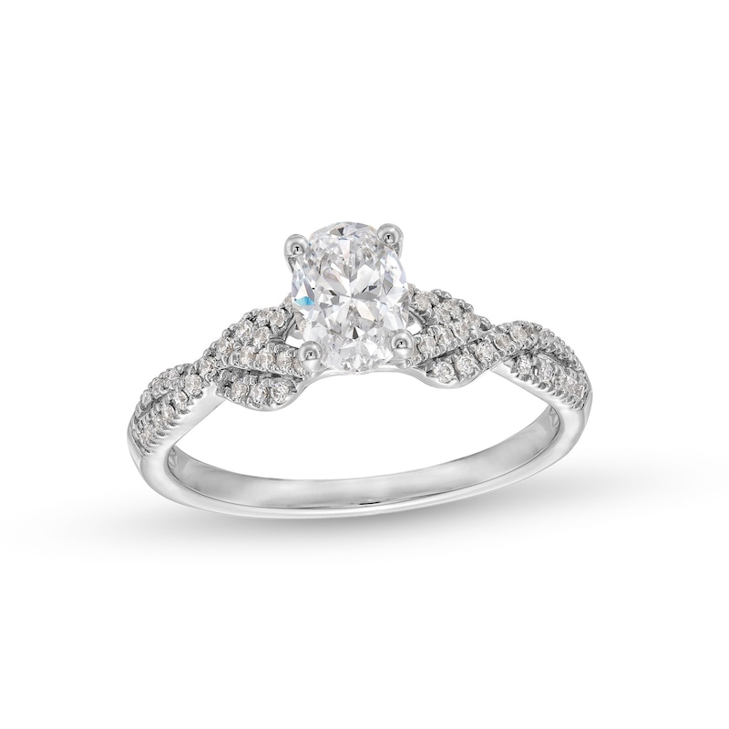 Main Image 1 of 3/4 CT. T.W. Oval Diamond Twist Shank Engagement Ring in 14K White Gold