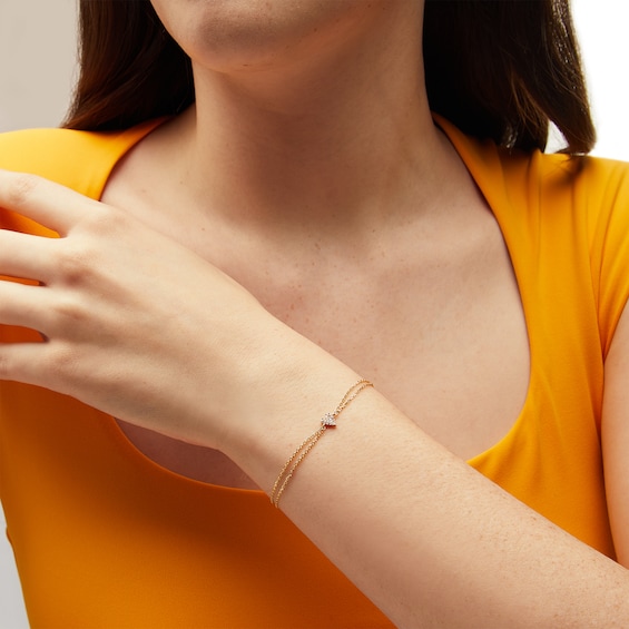 1/20 CT. T.w. Heart-Shaped Multi-Diamond Double Chain Bracelet in 10K Gold - 7.25"