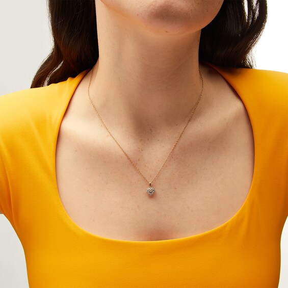1/5 CT. T.w. Heart-Shaped Multi-Diamond Frame Pendant in 10K Gold