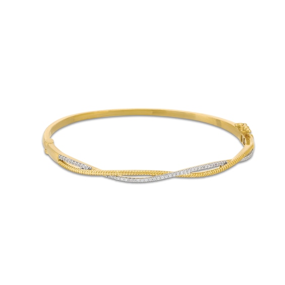 1/4 CT. T.w. Diamond and Rope-Textured Ribbon Twist Bangle in 10K Gold