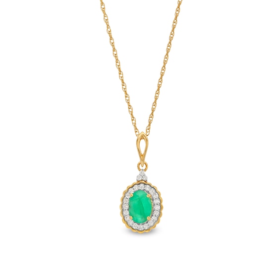 Oval Emerald and 1/6 CT. T.w. Diamond Scallop Frame Drop Pendant in 10K Gold