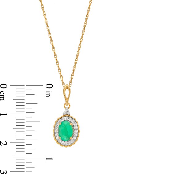 Oval Emerald and 1/6 CT. T.w. Diamond Scallop Frame Drop Pendant in 10K Gold