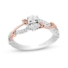 Thumbnail Image 1 of Enchanted Disney Belle 3/4 CT. T.W. Oval Diamond Crossover Rose Shank Engagement Ring in 14K Two-Tone Gold