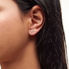 Thumbnail Image 2 of 1/10 CT. T.W. Diamond Bow Stud Earrings in 10K Gold