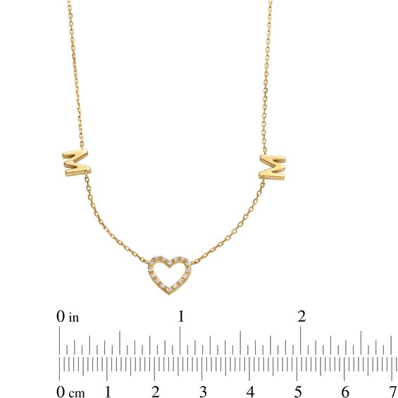 1/15 CT. T.w. Diamond Mom Heart Station Necklace in 10K Gold - 17"