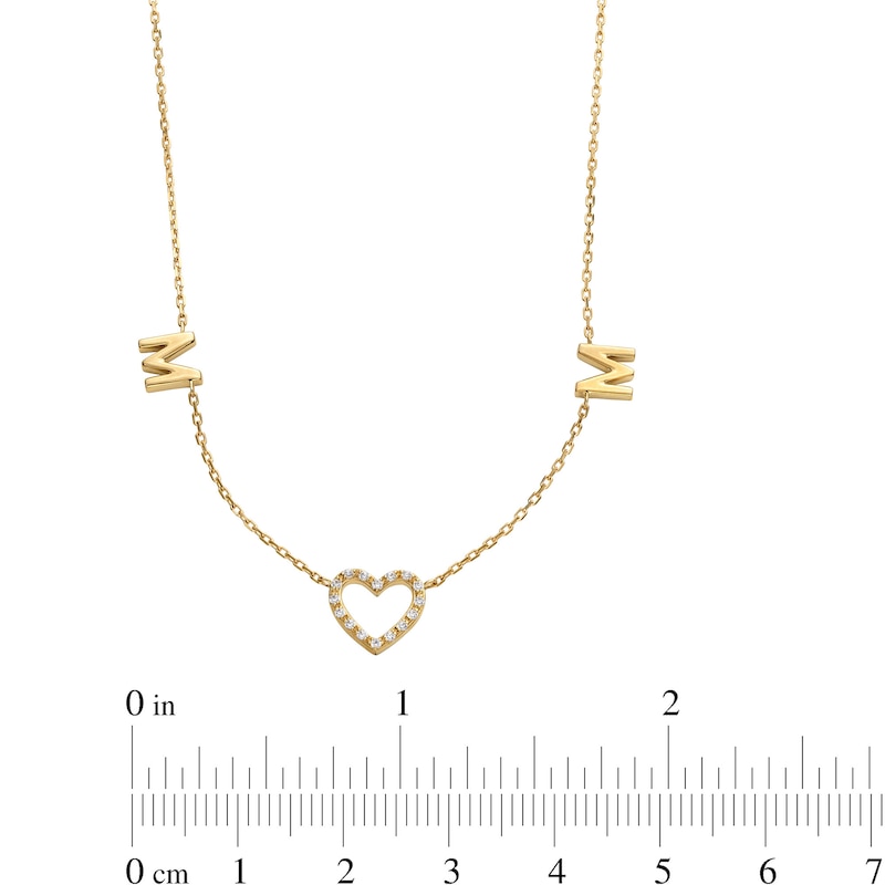 1/15 CT. T.W. Diamond "MOM" Heart Station Necklace in 10K Gold - 17"